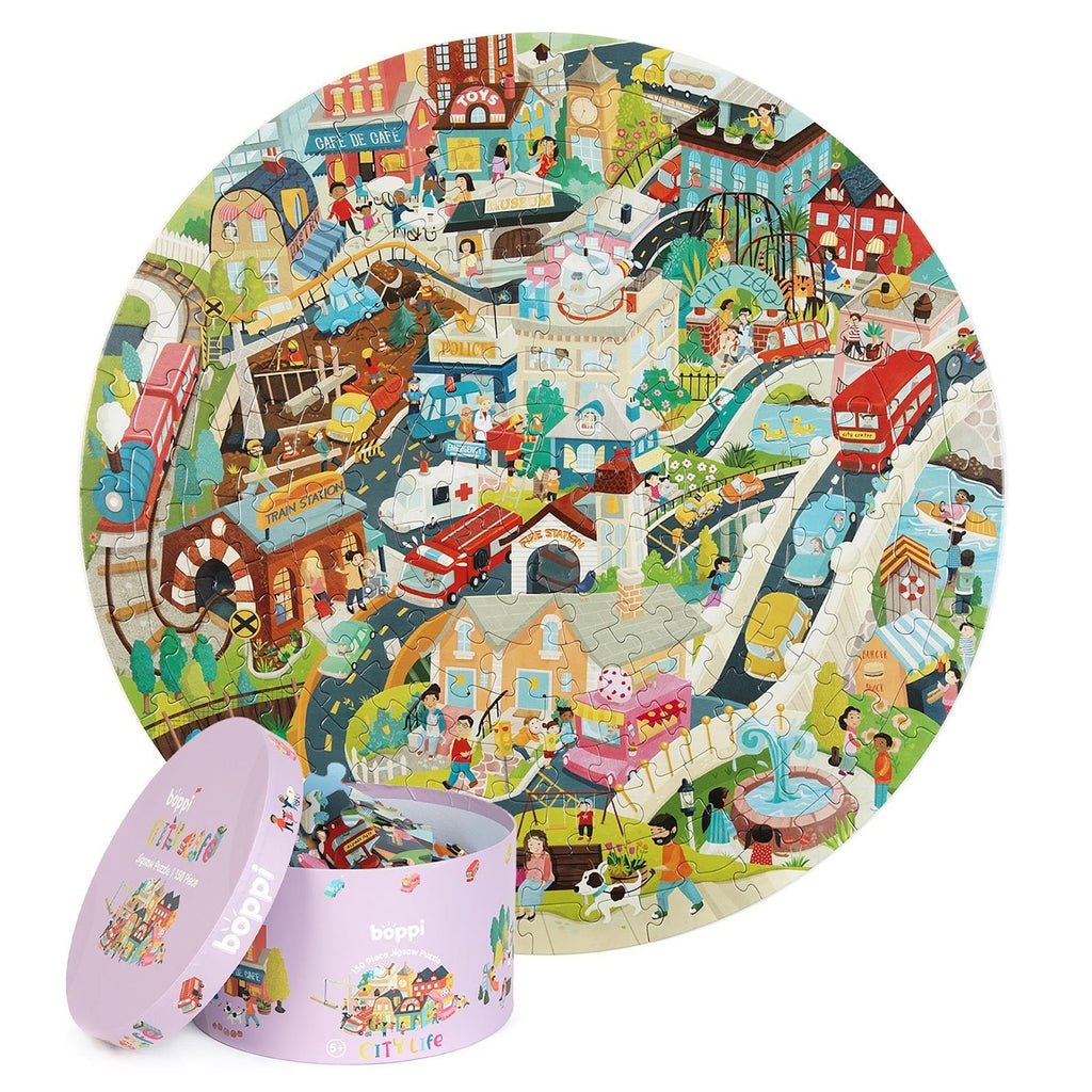 Ronde kinderpuzzel met stadsleven-thema en bijpassende opbergdoos, kleurrijke illustratie van een drukke stad.