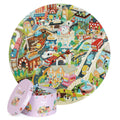 Ronde kinderpuzzel met stadsleven-thema en bijpassende opbergdoos, kleurrijke illustratie van een drukke stad.