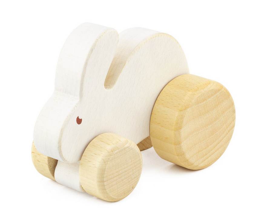 Houten figuur op wieltjes in de vorm van een wit konijntje voor baby